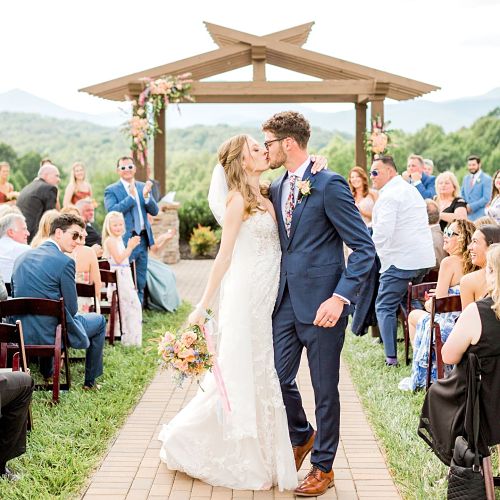 Bride and groom kissing